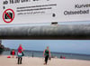 Am Strandaufgang in Boltenhagen informiert ein Schild über die Fotoregeln für Urlauber.