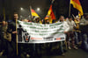 Viele Pegida-Demonstranten üben auch Kritik an den deutschen Medien.