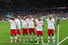 Die türkischen Spieler salutieren, als sie ein Tor gegen Frankreich feiern.