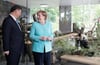 Bundeskanzlerin Angela Merkel (CDU) und der Staatspräsident von China, Xi Jinping, im Zoo in Berlin bei der Eröffnung der neuen Anlage für zwei Pandabären aus China.