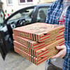 Maskierte rauben Pizza–Lieferdienst aus