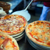 Jugendliche schieben Pizza in Ofen und verursachen 500.000 Euro Schaden