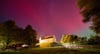 Polarlichter am Himmel über der Burg Wesenberg